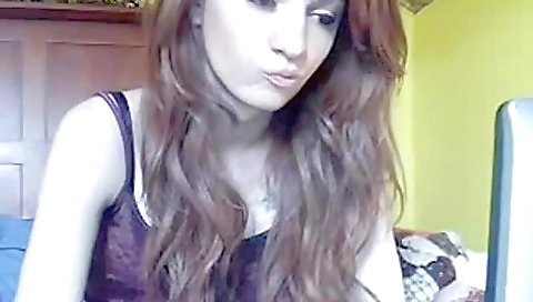 A beautiful woman with a beautiful body takes off her clothes